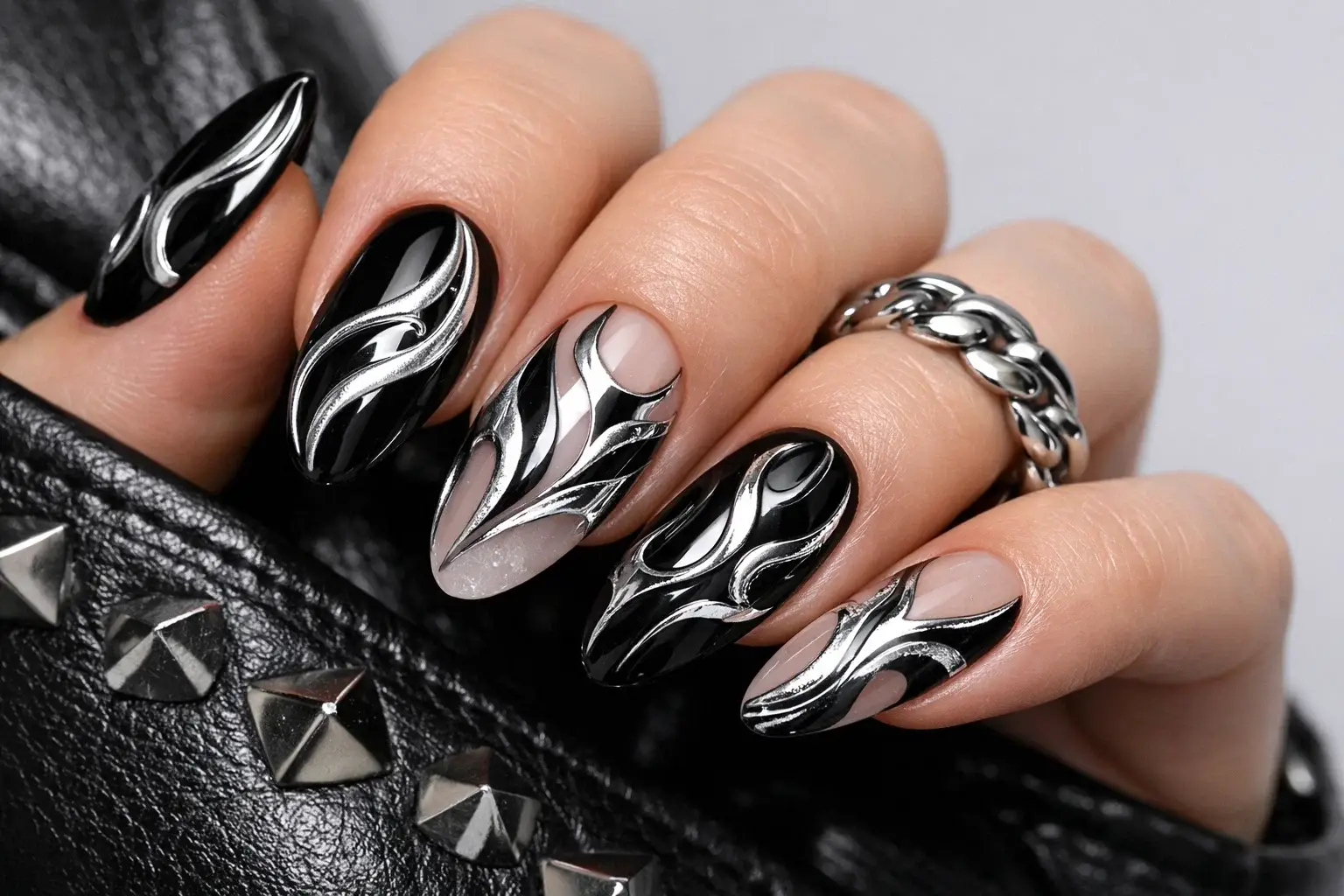 Futuristic Chrome and Silver Swirl Nails