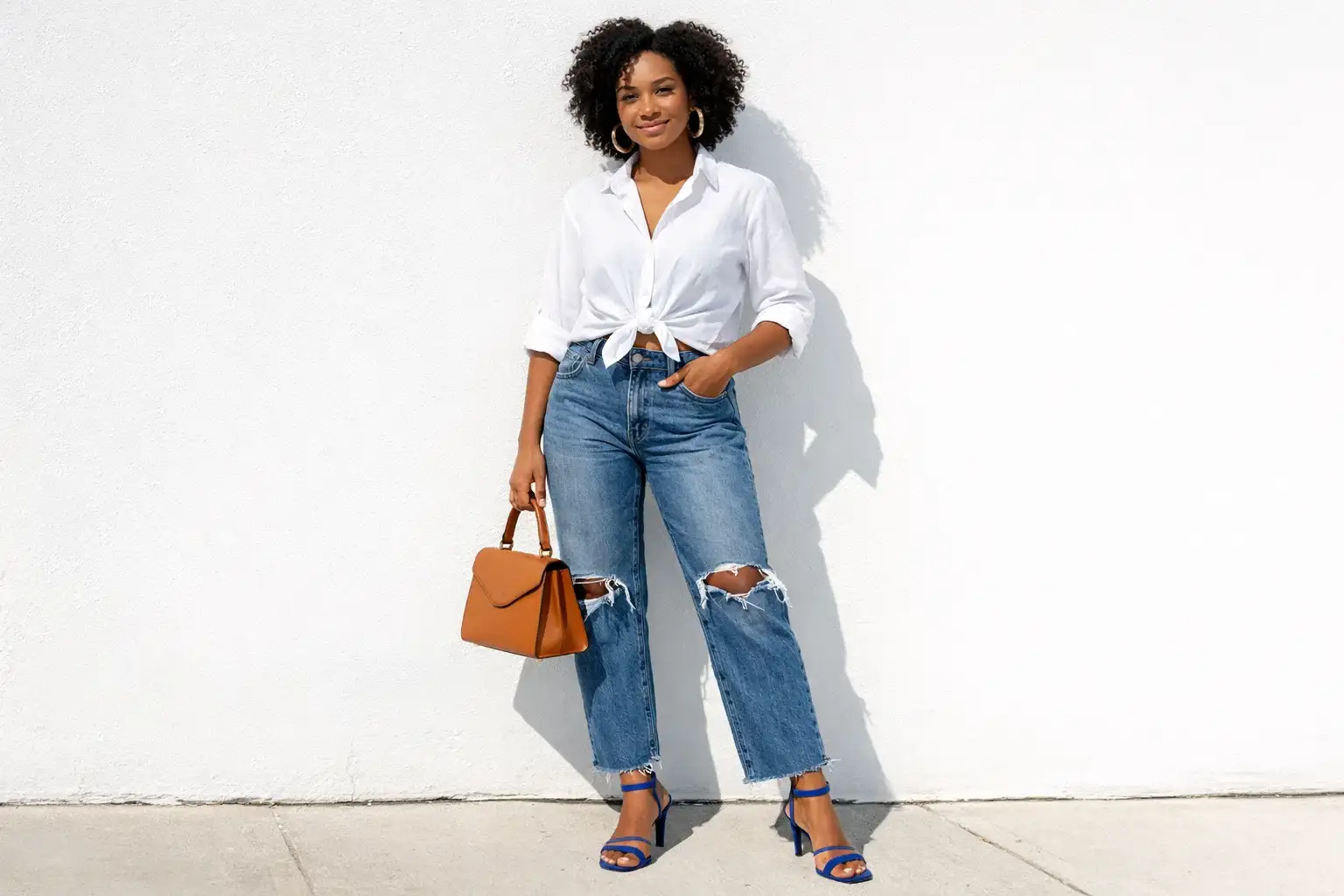 The Tied White Button-Down with High-Waisted Ripped Jeans